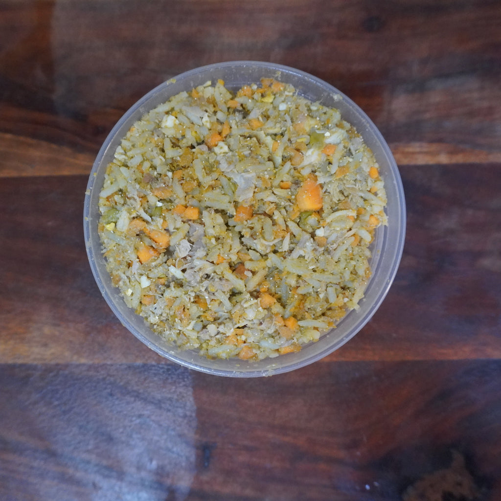 Paw Heart Food Co. Ancestral chicken bowl with rice, carrots, yams, peas, sardines, egg, salmon oil and micro-nutrients